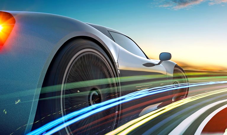 3D render of a gray sports car with a less-than-perfect blur effect