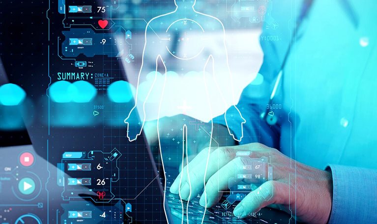 A futuristic medical interface displays a holographic human body and health metrics as a clinician works on a computer.