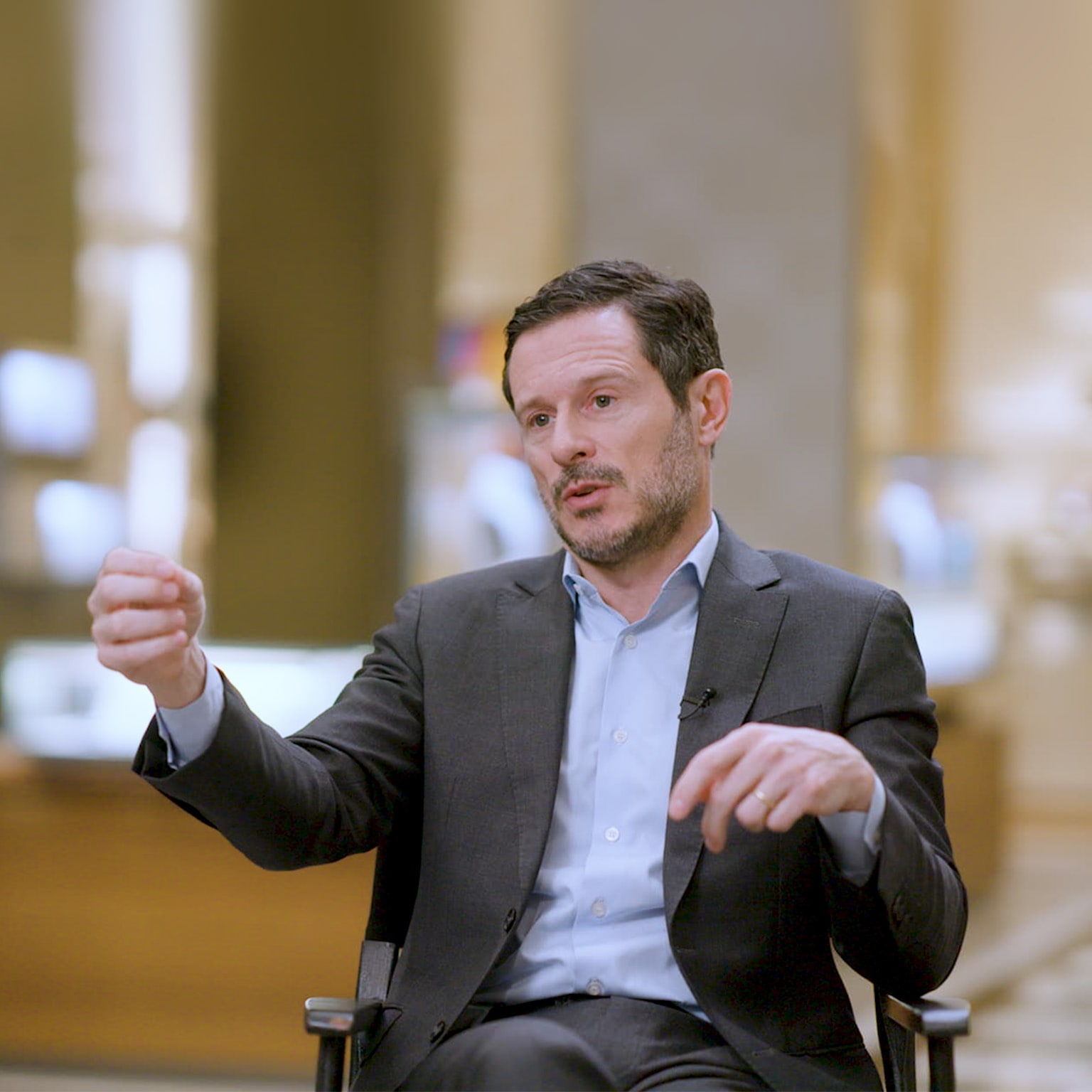 An image of Olivier Bron answering a question during an interview.