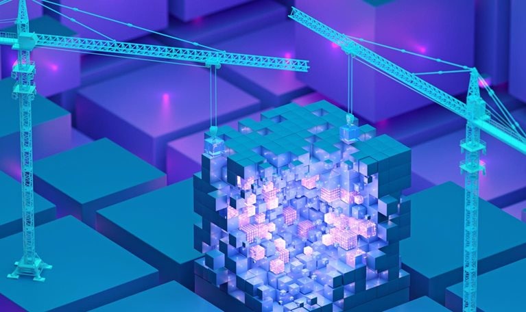 Two teal construction cranes stand on opposite ends of a large, luminous cube made up of numerous smaller cubes. The cranes are carefully placing additional cubes onto the structure, hinting at the building of a digital framework.