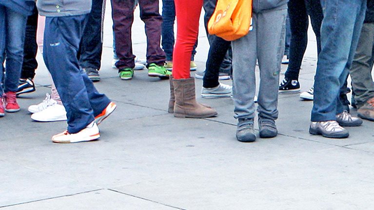 People standing in queue - stock photo
