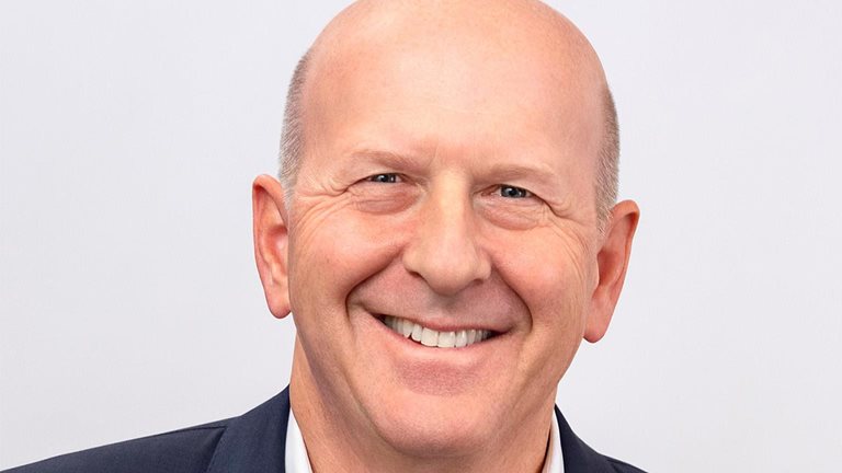 Smiling portrait of David Solomon, CEO at Goldman Sachs