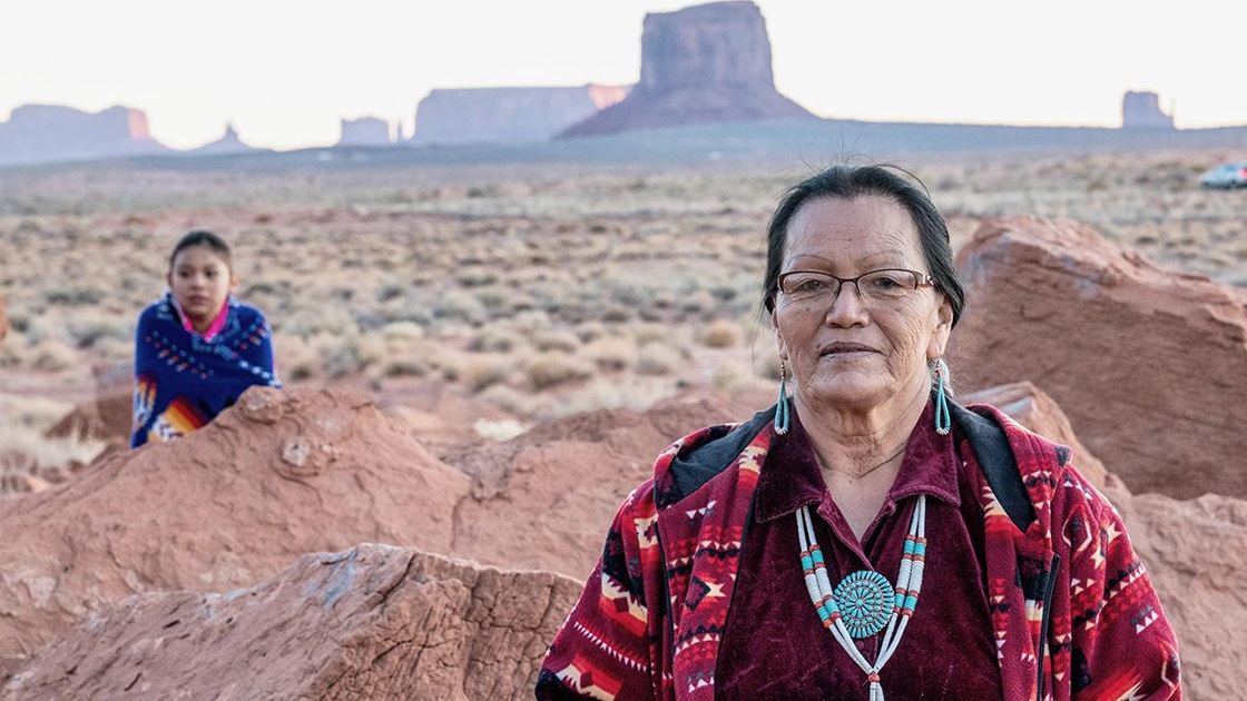 two people standing outside