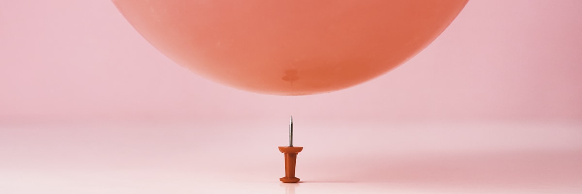 illustration of balloon and pin