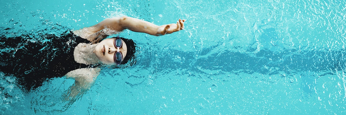 photo of woman swimming