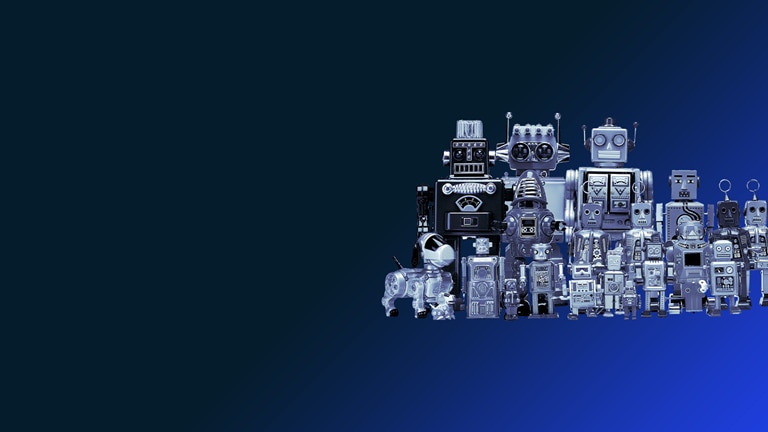 Image of several toy robots on blue background