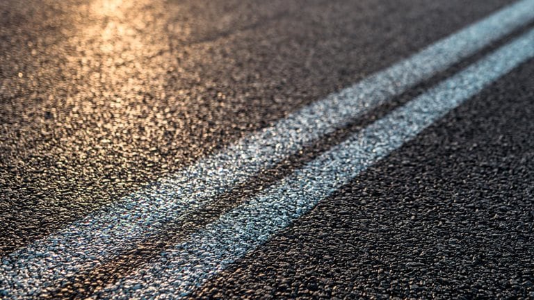 Image of sunlight on a road