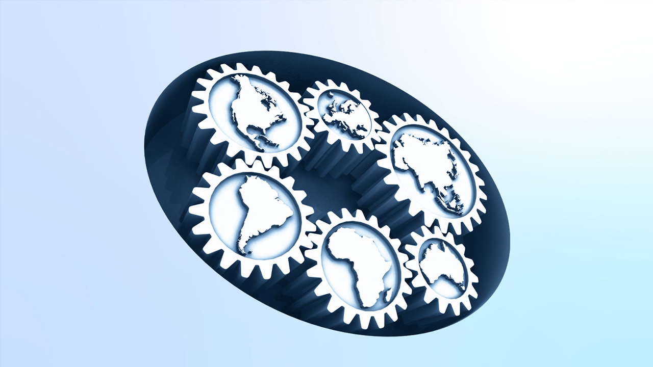 Digital image of continents on a cogwheel