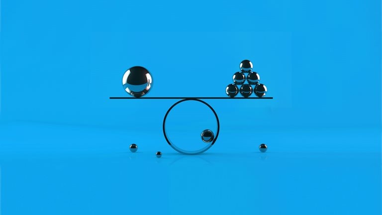Illustration of a scale balancing one large ball and six small balls on opposite sides