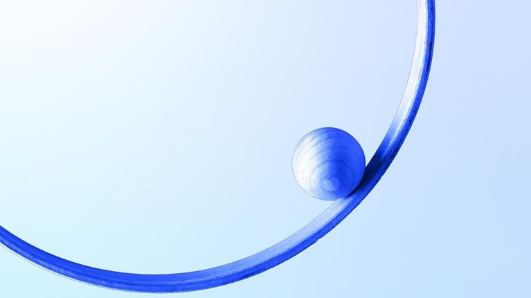 Blue sphere in a blue 3d circle levitation against white colored wall background; balance and concentric concept