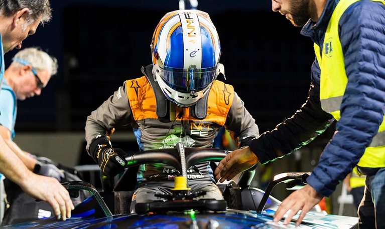 Jake Hughes, Formula E driver, enters his car