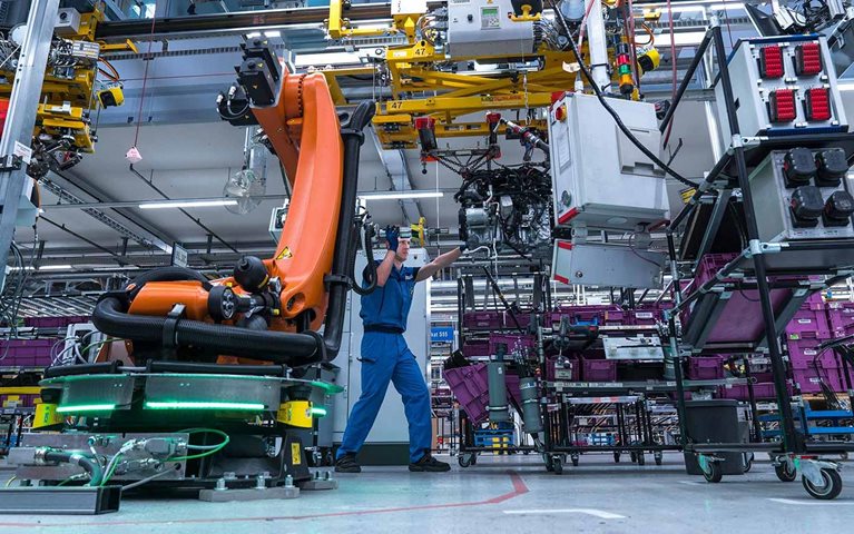 At these factories, robots are making jobs better for workers