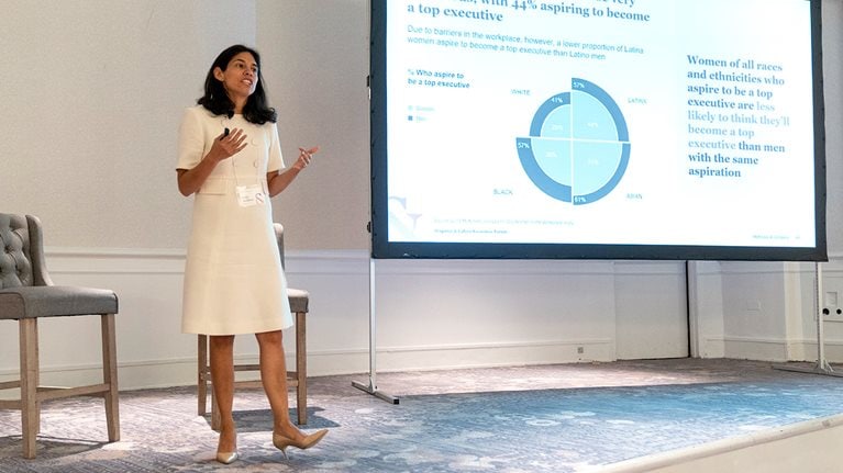 Carla Arellano, a McKinsey partner, presents statistics on Latinas in the workplace