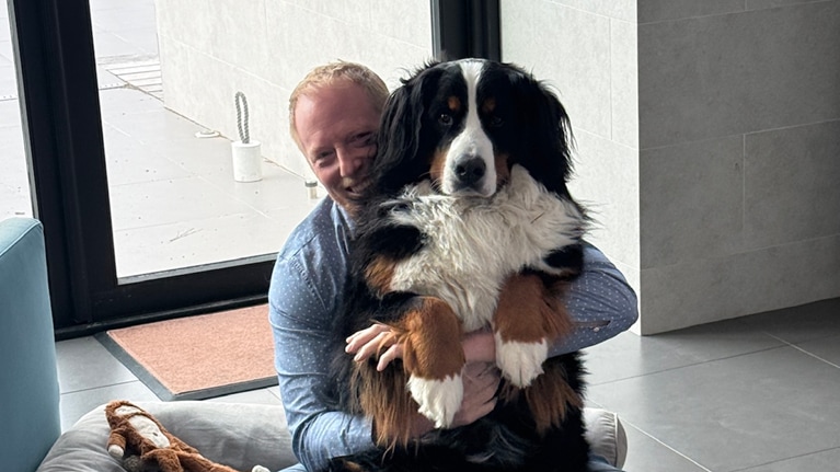 Kirk with his dog, Theo.