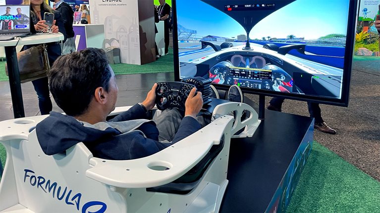 Dreamforce attendees try out McKinsey's AI-powered Formula E electric race car simulator