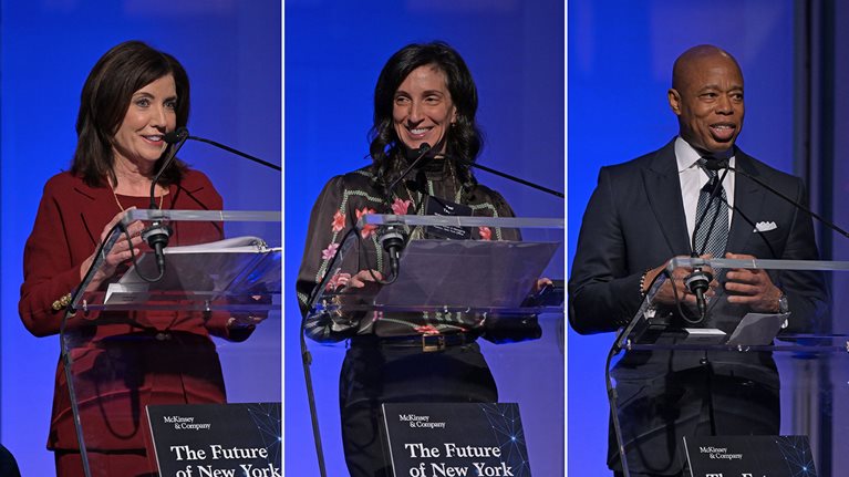 From left, Governor Kathy Hochul, senior partner and managing partner for McKinsey's New York Office Yael Taqqu, and Mayor Eric Adams, speaking at the second Future of New York Summit hosted by McKinsey.
