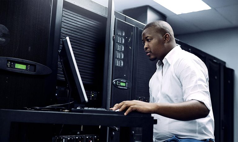 IT Technician running diagnostics on servers 