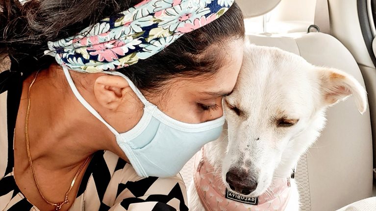 Close up shot of Padma with her dog