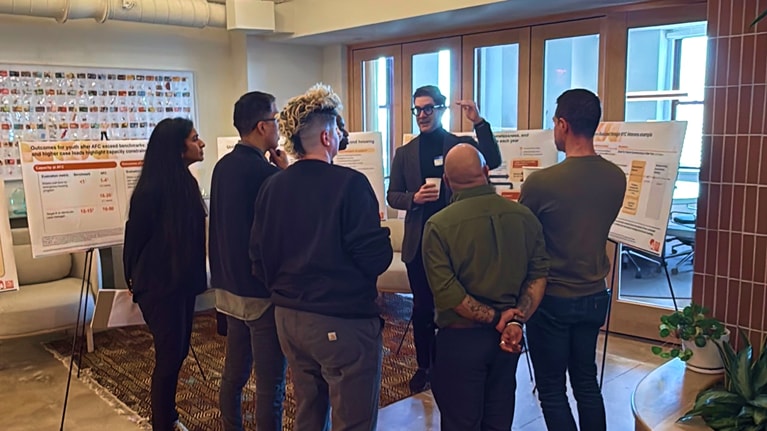 McKinsey Partner Sebastian Kohls, center, discussing strategy at the Ali Forney Center strategic planning retreat.