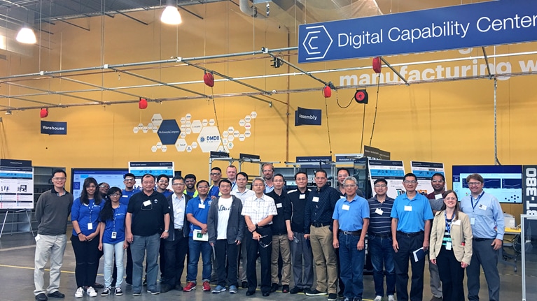 Enno (second row center) with learners at a McKinsey Digital Capability Center