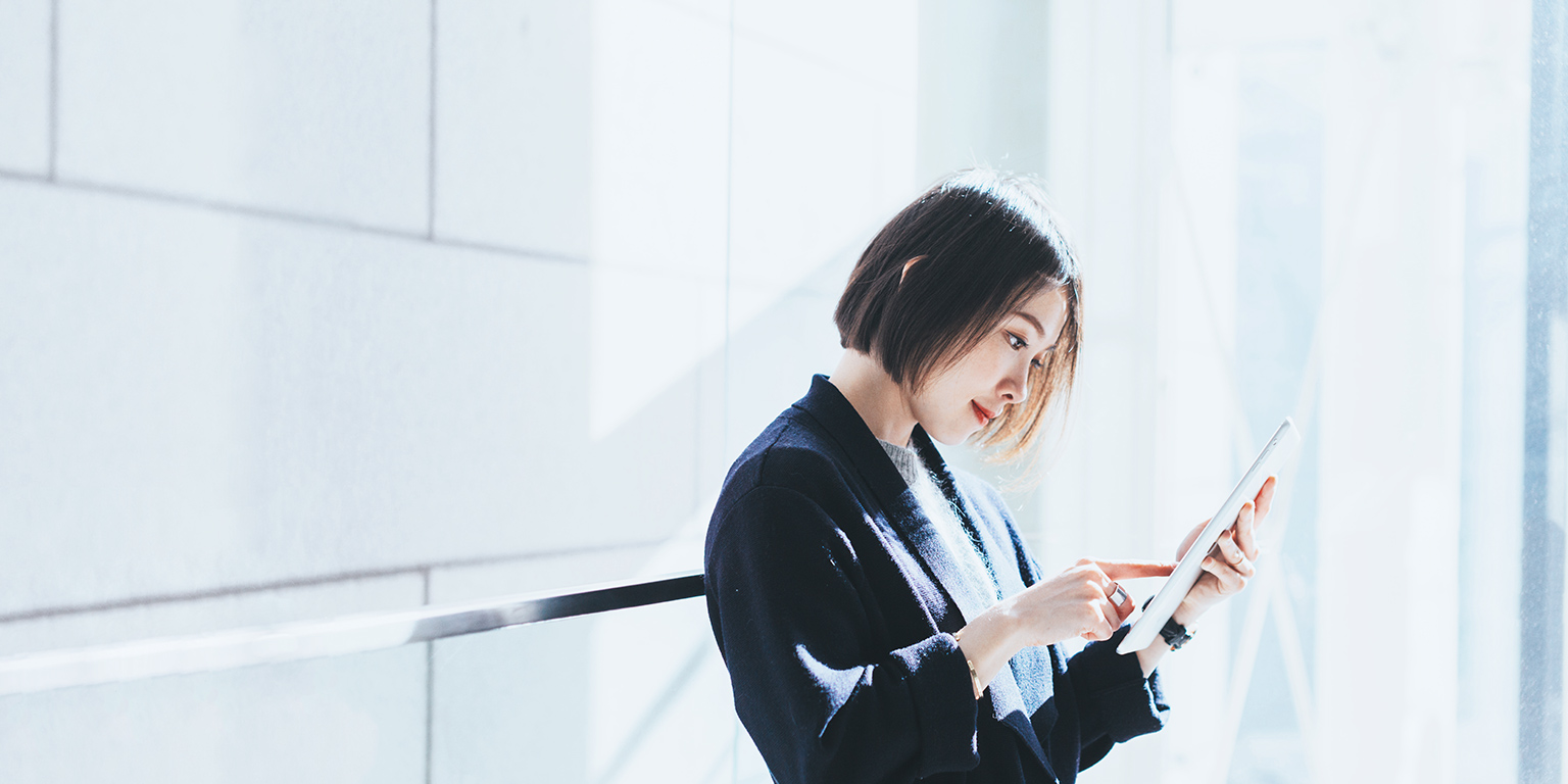 Asian businesswoman with digital tablet