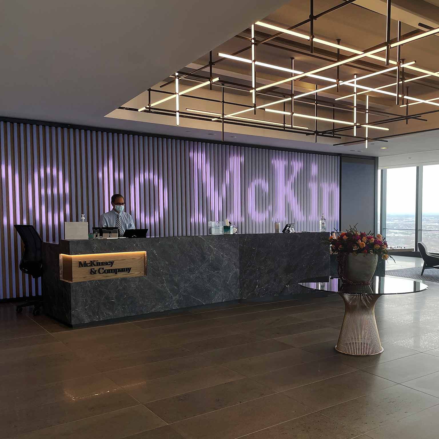 McKinsey & Company lobby area with a reception desk for visitors