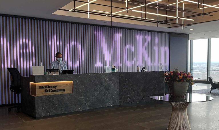 McKinsey & Company lobby area with a reception desk for visitors