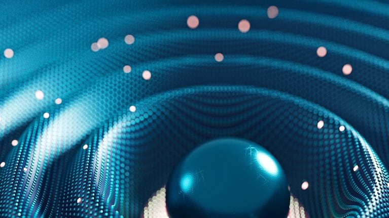 A glossy dark teal sphere resting in the center of rippling, wave-like dotted patterns with small glowing particles floating around it.