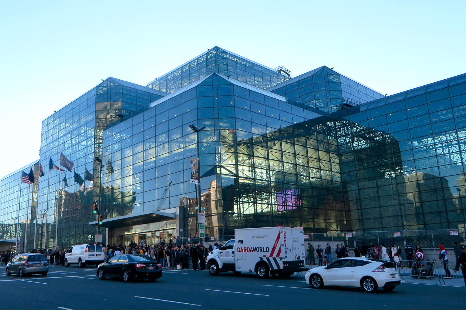 The image shows the Jacob K. Javits Convention Center in New York City.