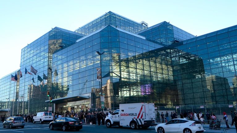 The image shows the Jacob K. Javits Convention Center in New York City.