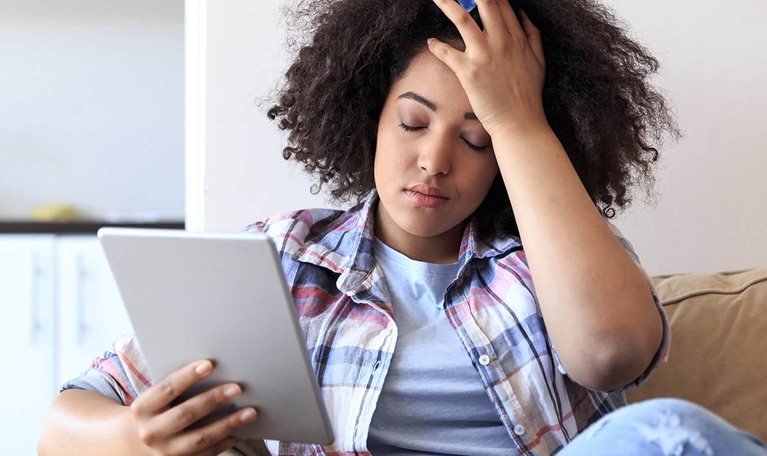 Woman With Digital Tablet Having Trouble - stock photo