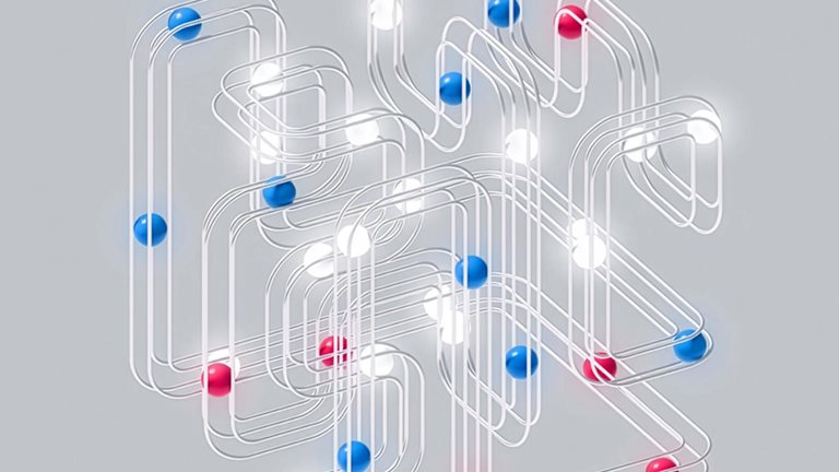 Abstract 3D image of a wire looping tracks with blue, pink, and glowing white spheres placed throughout.