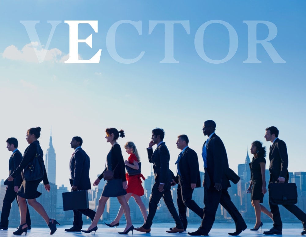 Group of businesspeople walking with the E highlighted in VECTOR text overlay