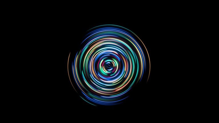 Colorful Spinning Light Trails - stock photo