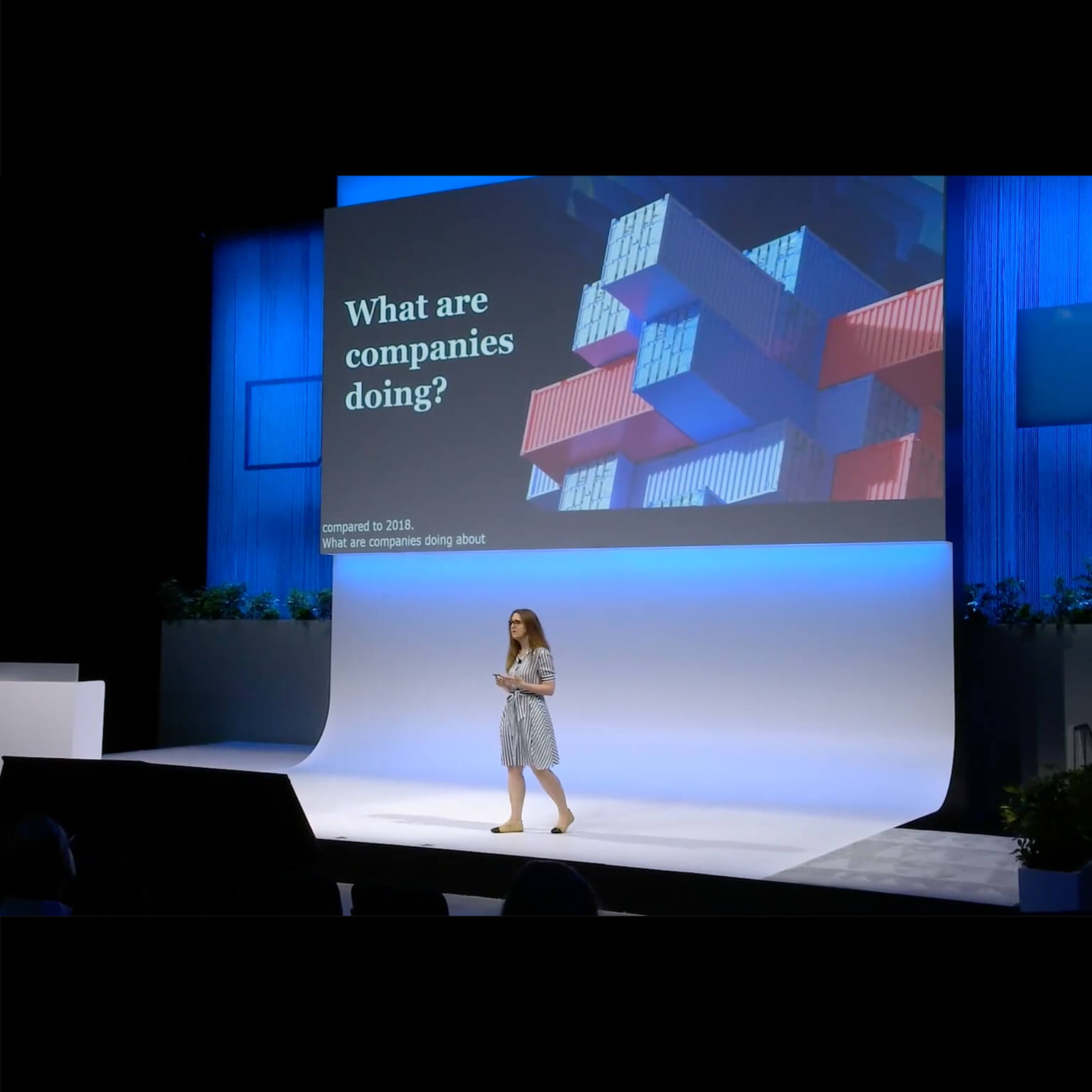 Liz Hempel on stage giving featured SAP Sapphire 2025 McKinsey session.