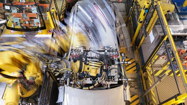 Building smarter cars with smarter factories: How AI will change the auto business