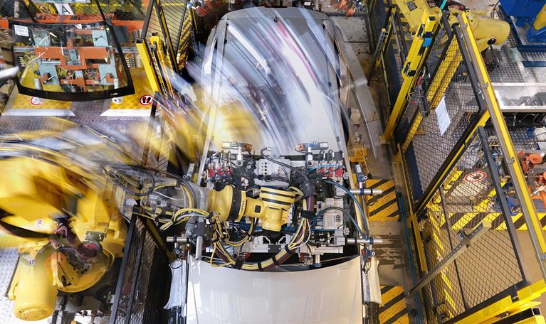 Building smarter cars with smarter factories: How AI will change the auto business