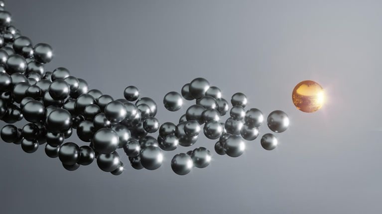 Abstract flying golden sphere and the others following it