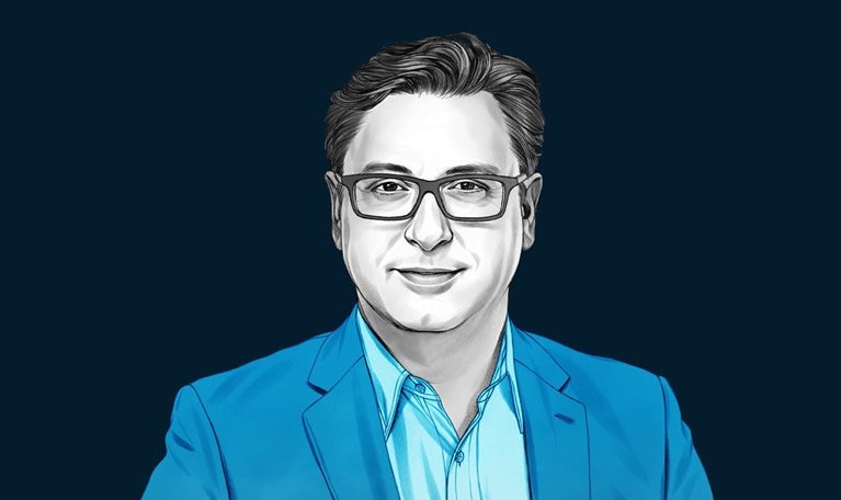 A hand-drawn illustration of Paul Hudson, smiling and wearing a button-down shirt and blazer. The drawing features precise lines and subtle shading, using black and white tones for her face and blues for her attire.