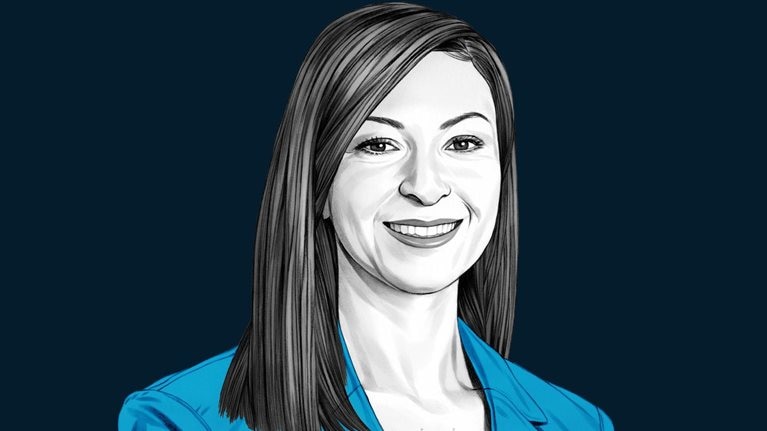 A hand-drawn illustration of Ruba Borno, smiling and wearing blazer. The drawing features precise lines and subtle shading, using black and white tones for her face and blues for her attire.