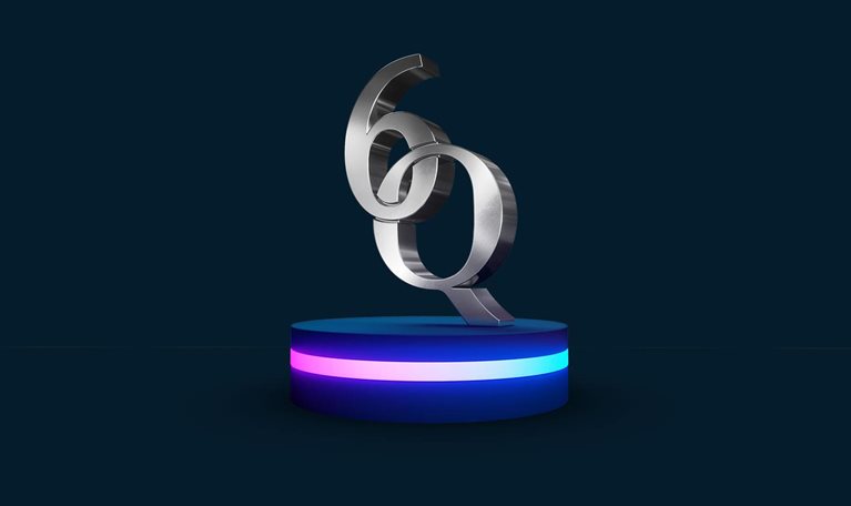A striking monolithic sculpture made of polished steel stands on a cylindrical platform, featuring two intertwined letterforms: the number 6 and the letter Q. Together, they symbolize the 60th anniversary of McKinsey Quarterly. The Q creatively doubles as the zero in “60.”