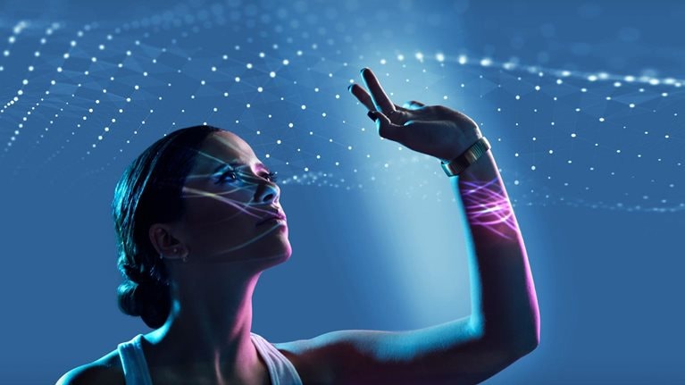 Caucasian woman with high technology effects on and around her - stock photo