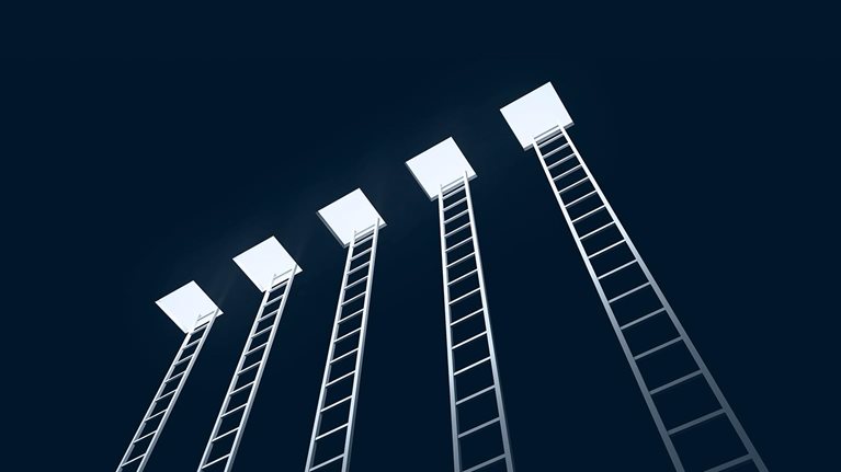 Five ladders leading to the exit, black background - stock photo