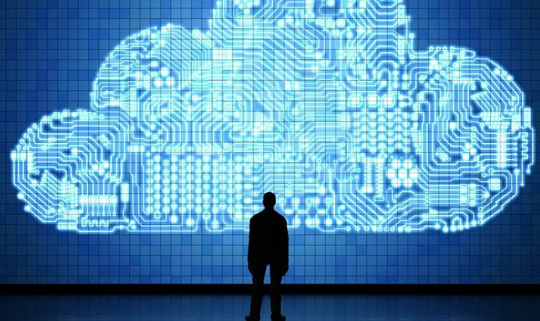silhouette of man standing in front of digital cloud illustration