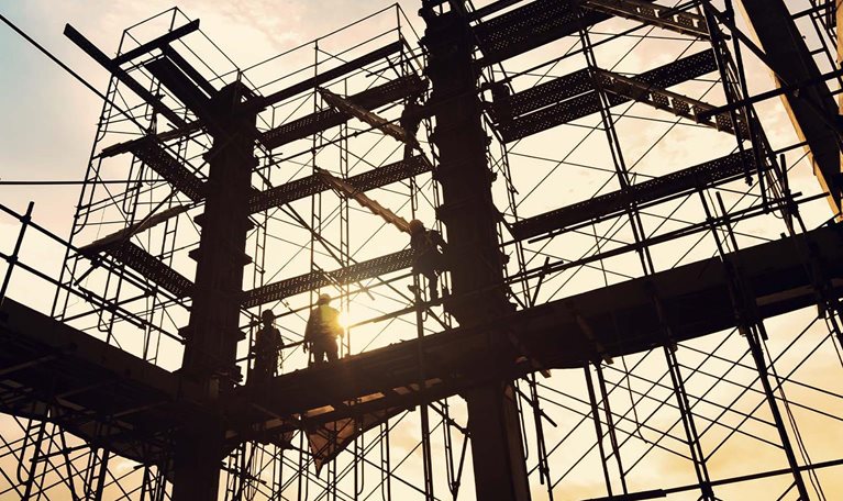 Construction site on sunset background