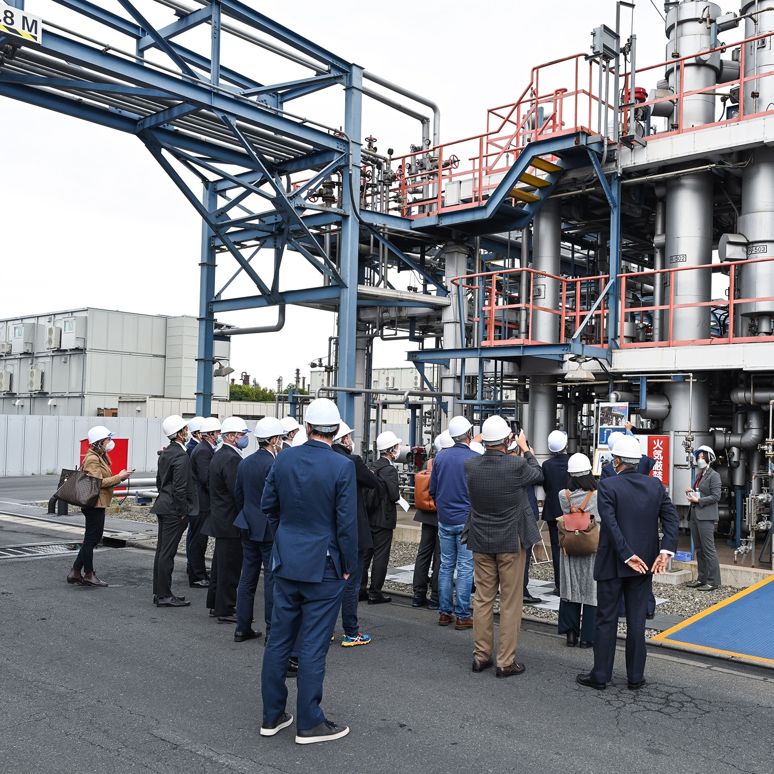 visitors outside Tokyo factory photo