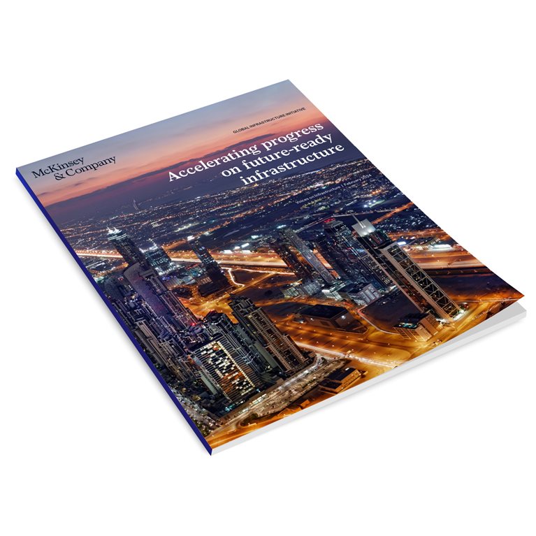 Elevated cityscape of Dubai illuminated at dusk - stock photo