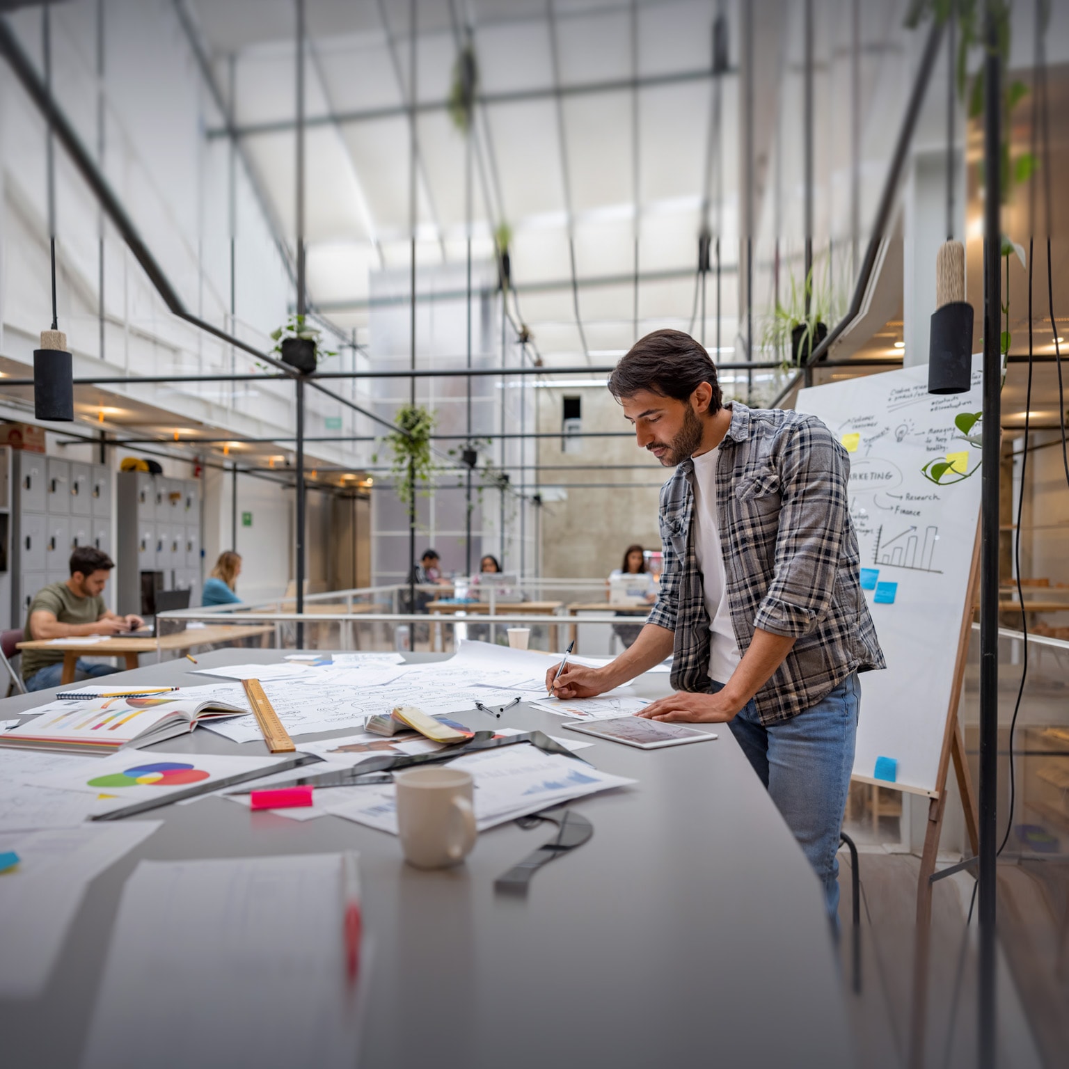 Creative business man working at a coworking space - stock photo