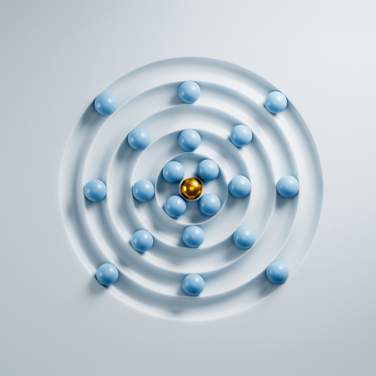  Golden sphere leading many light blue spheres in a concentric circle pattern