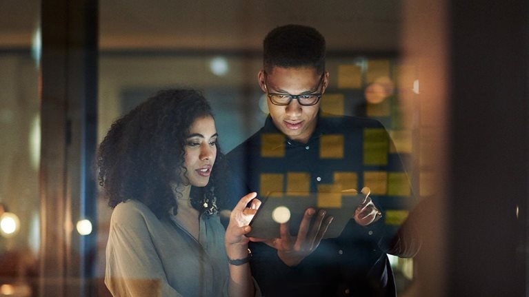 Taking on the night’s tasks with digital tech - stock photo